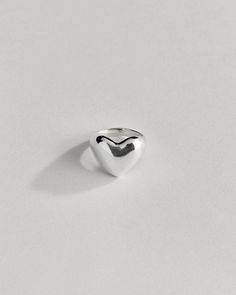 A larger version of our classic Heart Ring for extra boldness. Personalize your heart with our engraving offerings below - There's room for 3 characters. Hesrt Rings, Heart Ring Sterling Silver, Heel Accessories, 3 Characters, Silver Heart Ring, Heart Shaped Rings, Book Candle, Ring Size Guide, Silver Pieces