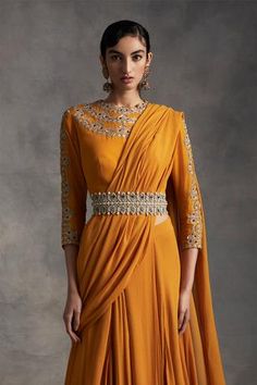 Shop for Bhumika Sharma Yellow Satin Crepe Pre-draped Lehenga Saree for Women Online at Aza Fashions Embellished Draped Sharara For Reception, Festive Embellished Draped Lehenga, Navratri Embellished Draped Lehenga, Embellished Draped Lehenga For Reception, Fitted Embellished Draped Sharara, Designer Draped Lehenga With Unstitched Blouse, Semi-stitched Draped Sharara With Zari Work, Designer Draped Sharara For Diwali, Traditional Draped Embellished Sharara