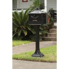 a mailbox in front of a house