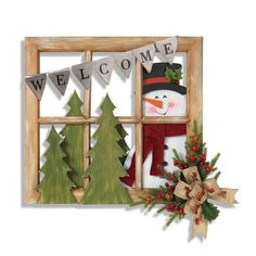 a snowman and christmas trees are in front of a window with welcome signs on it