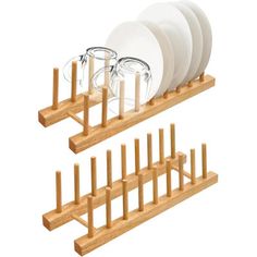 a wooden rack with plates and glasses on it