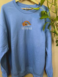 Whether it's for yourself or a gift, get cozy, comfy, and stylish with this embroidered sweatshirt. Crewnecks are embroidered with a one-of-a-kind design inspired by places, experiences, and adventures! ⭐  PRODUCT DETAILS * Unisex Sizing * Sweatshirts: 50% cotton, 50% polyester * T-Shirts: 100% cotton * Size up 1-2 sizes for a looser comfy fit ⭐  CARE INSTRUCTIONS Wash with cold water. Hang drying is recommended but dry low if needed. ⭐  RETURNS & EXCHANGES Returns and exchanges are not accepted Rainbow Hoodie, Somewhere Over The Rainbow, Embroidered Crewneck, Sweatshirt Vintage, Embroidered Sweatshirt, Over The Rainbow, Embroidered Sweatshirts, Getting Cozy, Comfy Fits