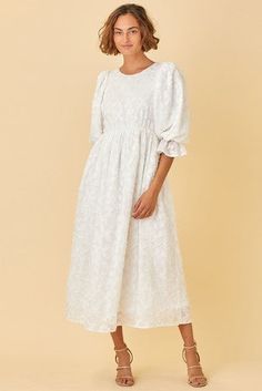 This 3/4 sleeve dress features a round neck and a textured floral pattern. Fully lined and covers elbows. 3/4 Sleeve Dress, White Dress With Sleeves, Spring Inspo, Floral Midi Dress, Modest Dresses, Cute Casual Outfits, Sleeve Dress, Sewing Projects, Floral Pattern