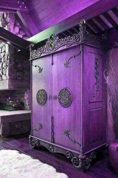 a purple cabinet in the middle of a room