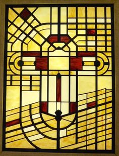 a stained glass window with an abstract design