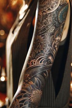 a woman's arm with tattoos on it