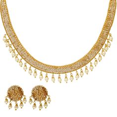 This radiant 22k yellow gold and polki jewelry set has an elegant and sophisticated design any women would love. The traditional polki stones used in this magnificent Indian jewelry set for women is enhanced by a dazzling assortment of white pearls to complete the look. Features • 22k yellow gold • CZ stones • Pearls • Filigree Virani Jewelers bridal jewelry made from 22k gold and precious gemstones brings together the beauty and significance of Indian culture and traditions. Find more beautiful 22k Gold Pearl Necklace For Celebrations And Festivals, 22k Gold Pearl Necklace For Diwali, Elegant Round Kundan Necklace For Eid, Festive Gold Diamond Temple Necklace, Elegant Kundan Necklace For Eid, White Cubic Zirconia Bollywood Jewelry, Dazzling Gold Jewelry Sets For Festive Season, Dazzling Gold Jewelry Sets For Festive Occasions, Bollywood Style White American Diamond Jewelry