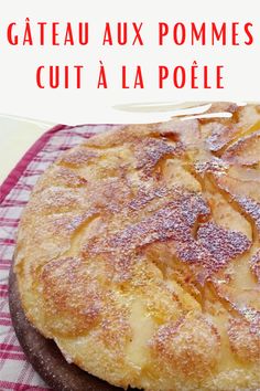 a close up of a pie on a table with words above it that read, gaeau aux pommes cut al pote