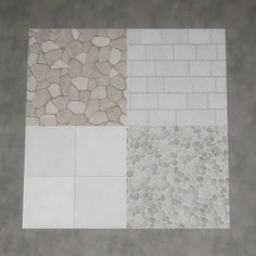 the floor is made up of different types of stones and cements, including white tiles