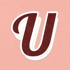 the letter u is made up of red and white stickers on a pink background