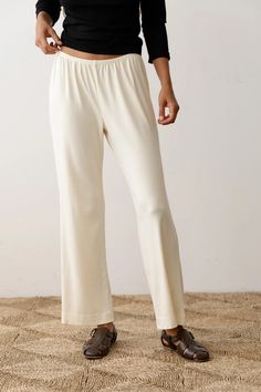 The Baby Rib Scallop Pant Solid Viscose Bottoms With Elastic Waistband, Solid Color Viscose Bottoms With Elastic Waistband, Viscose Wide-leg Pants For Daywear, Solid Viscose Trousers, Beige Pants With Ribbed Waistband For Spring, Relaxed Fit Viscose Bottoms With Elastic Waistband, Viscose Long Pants For Daywear, Cream Wide-leg Pants For Daywear, Chic Cream Bottoms For Daywear