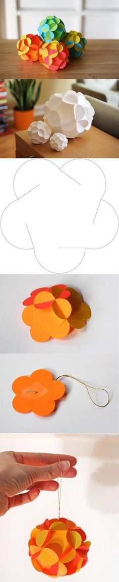 paper flowers are being cut out and placed on top of each other to make an origami flower