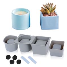 various containers with candles and succulents in them