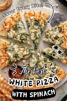 a white pizza with spinach on it and the words, savor every bite