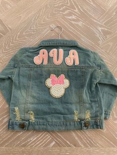 Personalized pearled mouse (with bow and without bow) Denim Jacket that can be personalized with names and numbers in any color. Made to order.  We have sizes 0-12 months, 2T -6T. Please specify size you'd like. All jackets are pure denim. Denim shade may vary depending on availability. Please ask me for further details if you have questions or concerns. Kids Denim Jacket, Kids Jackets, Kids Denim, Miami Fl, Kids Jacket, 12 Months, Gender Neutral, Miami, Denim Jacket