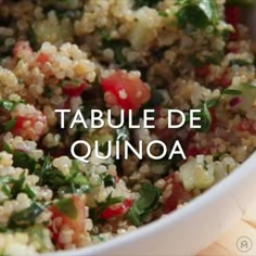 a white bowl filled with food and the words table de quinoa