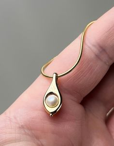 Step into a realm of Personalized elegance at our boutique, where unique stories are embodied in our Mother's Peapod® Jewelry - Personalized Birthpearl® Necklace. Crafted in Sterling Silver, Luxurious Vermeil, or Opulent 14k white, rose & Gold, this necklace is more than an adornment; it's a treasured gift for birthdays or a cherished keepsake. Handmade with love, each piece cradles a Birthpearl® that represents a beloved person's birth month. Versatile at approximately 1 inch in size, this Peap Gold Dainty Necklace, Gift For Bridesmaids, Pea Pods, Jewelry Personalized, Dainty Gold Necklace, Fresh Water Pearl, Station Necklace, Birth Month, Love Symbols