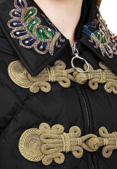 This jacket has been fashioned in Italy from a lightweight black fabric, insulated with goose down for added warmth.The silhouette is sleek and understated, boasting long sleeves, a zip down front.Collared neckline.Quilted design.Embroidered peacocks.Multicoloured beaded shoulders.Gold-tone Mandarin knot buttons that run across the front.Polyamide 100% Polyamide 100% Acetate 23% Acrylic 74% Goose Down 100% metal 3%Dry Clean OnlyMade in Italy Fitted Gucci Winter Outerwear, Gucci Winter Outerwear With Padded Collar, Gucci Fitted Winter Outerwear, Luxury Embroidered Outerwear For Winter, Luxury Gucci Outerwear With Padded Collar, Gucci Luxury Outerwear With Padded Collar, Luxury Embroidered Outerwear, Luxury Embroidered Winter Outerwear, Gucci Embroidered Jacket