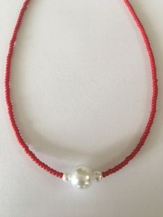 Opaque pepper red beaded glass necklace with glass pearl. Available in two different styles. Lightweight necklace secured with magnetic clasp for ease of use. Nov 1, Red Bead, Magnetic Clasp, Glass Necklace, Red Hot, Different Styles, Choker, Glass Beads, Beaded Necklace