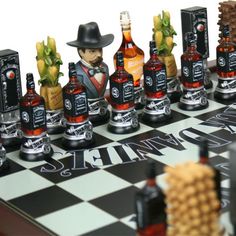 a chess board with bottles of alcohol on it and an image of a man in a cowboy hat