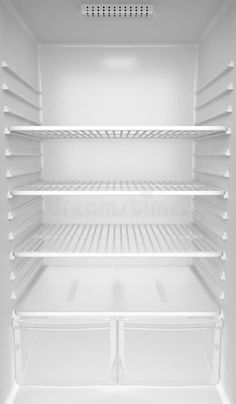 an empty white refrigerator with the door open