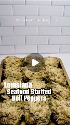 an image of food that is being cooked in the oven with words overlay reading, louisiana seafood stuffed bell peppers