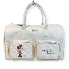 Disney Minnie Mouse White Quilted Weekender Travel Bag. Primark Exclusive * Large Open Interior * 2 Exterior Front Pockets * Double Handles With A Long Adjustable Shoulder Strap * Brand New With Tags, Never Used * Disney D Shaped Charm On Zippers This Is Perfect For All Disney Fans! Packing For A Getaway Just Got Easier With Our Disney Weekend Bag! Measures Approximately 18"L X 11"H X 8"D All Items Come From A Smoke-Free / Pet-Free Home I’m Open To Offers. Please Check Out My Other Listings To B Disney Minnie Mouse White Bag, White Disney Bags For Everyday Use, White Disney Everyday Bag, White Disney Style Bag, Disney Style White Everyday Bags, Disney White Travel Shoulder Bag, White Mickey Mouse Bag For Disney Fan Events, White Minnie Mouse Bag For Daily Use, Disney White Bags For Disney Trips