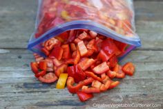 sliced red peppers in a plastic bag on a wooden table