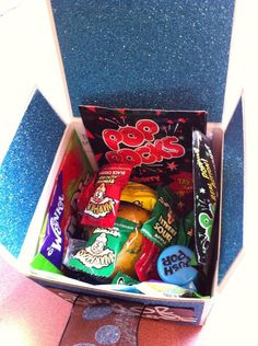 a box filled with lots of different types of candy