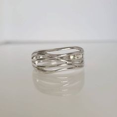 Solid Sterling Silver Ring, Woven Pattern Band, 925 Stamped High Polished Non Tarnish Top Of Ring Height: 10.3mm Band Width: 6.8mm Shank Width: 4mm Metal: 925 Sterling Silver Plating: Rhodium Plated ( To Avoid Tarnish ) Finish: High Polish K E E P I N T O U Ch Https://Instagram.Com/Emmaverajewelry Https://Www.Facebook.Com/Emmaveradesign Thank You For Visiting Wavy Ring, Bohemian Colors, Thumb Ring, Bohemian Rings, Woven Pattern, Thumb Rings, Womens Jewelry Rings, Sterling Silver Ring, Rhodium Plated