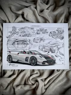 a drawing of a sports car on top of a blanket