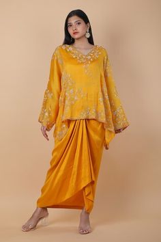 Yellow kaftan style top with floral zardozi embroidery. Comes with plain blouse and draped skirt. - Aza Fashions Fitted Kaftan With Traditional Drape For Festive Occasions, Wedding Raw Silk Kaftan With Traditional Drape, Festive Fitted Kaftan With Traditional Drape, Eid Blouse With Floral Embroidery And Traditional Drape, Eid Reception Blouse With Floral Embroidery, Floral Embroidered Pre-draped Saree For Eid Reception, Transitional Wedding Kaftan With Pallu, Floral Embroidered Pre-draped Saree For Reception And Eid, Fitted Kaftan With Dupatta In Traditional Drape