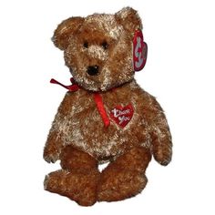 a brown teddy bear with a red ribbon around it's neck sitting on a white background