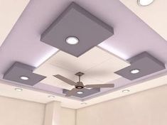 the ceiling fan is hanging from the ceiling in this room with white walls and ceilings