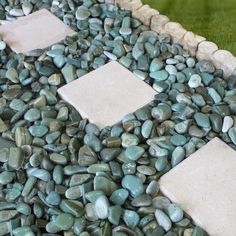 there is a stone walkway made out of rocks