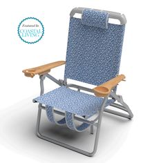 a blue and white lawn chair with wooden arm rests on a gray metal frame against a white background