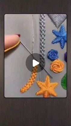 the video shows how to make crochet flowers