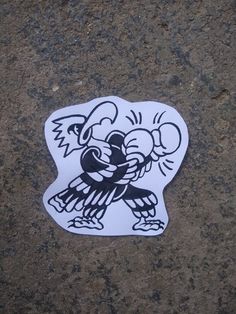 a sticker with a cartoon character on it