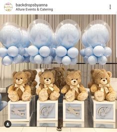 four teddy bears are sitting on pedestals with balloons in the shape of letters and numbers