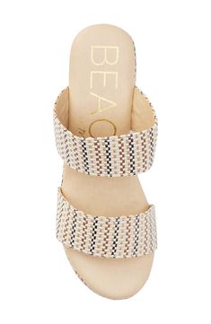 Braided raffia adds organic texture to this espadrille-inspired sandal raised on a walkable block heel and a lightly cushioned footbed. 2 1/2" heel; 2" platform Cushioned insole Textile upper/synthetic lining and sole Imported Women's Shoes Beige Straw Wedge Sandals With Textured Sole, Beige Synthetic Espadrilles With Woven Sole, Beige Straw Sandals With Textured Sole, Natural Sandals With Stacked Heel For Vacation, Beige Straw Heels For Beach, Beach Block Heels In Natural Color, Natural Block Heel Sandals For Beach, Natural Color Block Heel Beach Heels, Chic Beige Woven Sandals