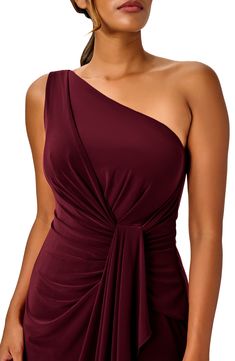 Steal the show anywhere you go in this jersey gown topped by a dainty one-shoulder neck and finished with a drapey detail. 60" length (size 8) One-shoulder neck Lined 95% polyester, 5% elastane Dry clean Imported One Shoulder Dark Red Dress, Maroon Evening Gown, Formal Dresses Long Elegant, One Shoulder Evening Dress, Long Dresses Elegant, Review Dresses, Straight Skirt, Adrianna Papell, Special Occasion Dresses