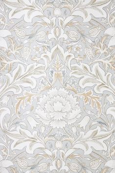 an intricately designed wallpaper with gold and silver accents