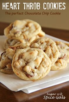 the perfect chocolate chip cookie is made with heart - shaped cookies and then topped with chopped pecans