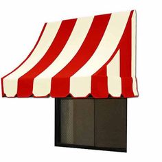 a red and white striped awning on top of a window