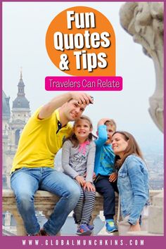 a man taking a selfie with his family on top of a building in paris