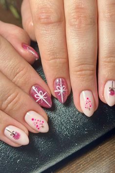 Celebrate the holidays in style with pink christmas nails that combine festive charm with modern flair. Our pink nail ideas feature detailed pink christmas nail art for stunning christmas season nails. Pin now to create perfect festive season nails. Pink And Red Holiday Nails, Pink Nails With Snowflakes, Pink Christmas Nail, Pink Christmas Nails, Pink Nail Ideas, Season Nails, Festive Manicure, Pink Nail, Christmas Nail Designs