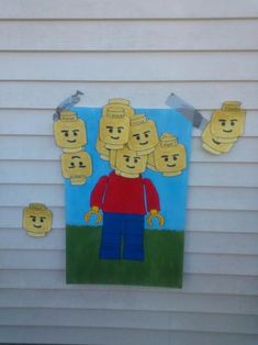 a painting on the side of a house that has been decorated with legos