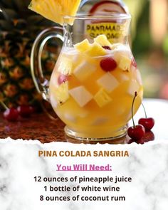 the pineapple punch is served in a pitcher