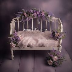 a baby crib with flowers on it and the words simply pleasure written in white