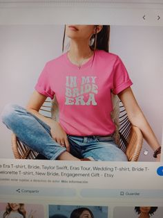 a woman sitting in a chair wearing a pink t - shirt with the words i'm my bachelor era on it